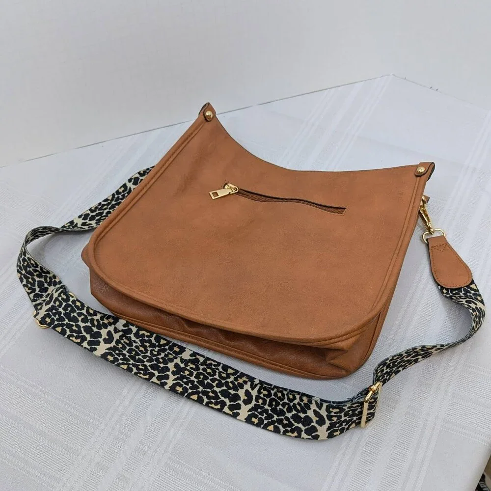 Leather crossbody Hobo style handbag - adjustable leopard print shoulder strap